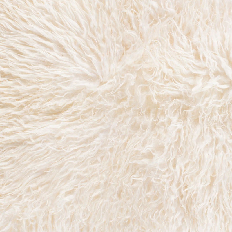 Beautifully soft long curly wool natural ivory Yeti sheepskin. A stunning boho-chic accessory for any interior. 