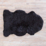Super-silky, very glossy, & luxurious, jet black dyed sheepskin Soft, thick, and luxurious. top quality From The Wool Company