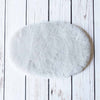 Silky soft, thick, & supportive luxury shorn dyed small sheepskin oval pet bed in attractive colours for a cat or small dog