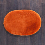 Silky soft, thick, & supportive luxury shorn dyed small sheepskin oval pet bed in attractive colours for a cat or small dog