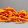 Genuine 100% cashmere pashmina in warm golden orange tones with tasselled fringe super-soft lightweight & warm finest-quality