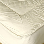 Reversible mattress topper with Merino wool pile with a luxurious lambswool filling.  super-soft, high-quality cotton cover 