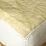 Reversible mattress topper with Merino wool pile with a luxurious lambswool filling.  super-soft, high-quality cotton cover 