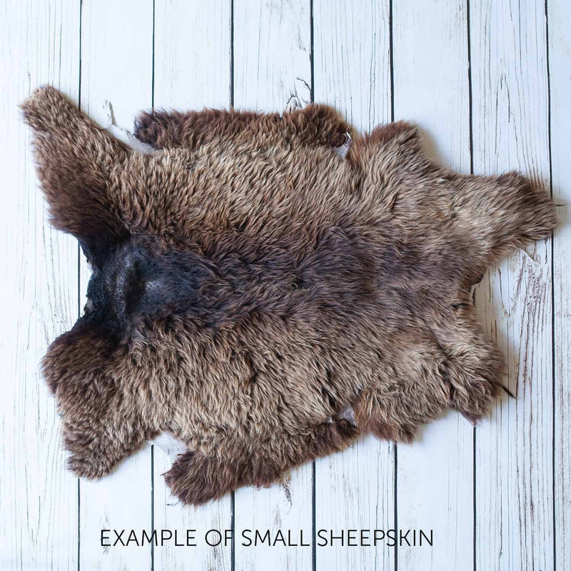 Soft, thick, & supportive British economy sheepskin pet bed or economical rug for the home or garden in chocolate brown tones