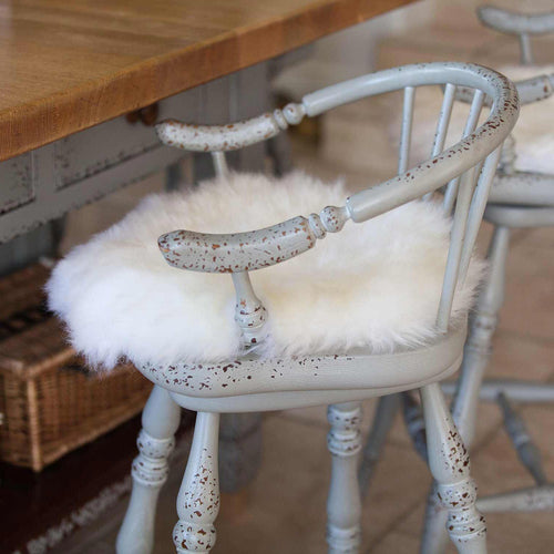 Sumptuous, natural sheepskin seat pad 38cm round, super-soft longwool fleece, natural white creamy colour By The Wool Company
