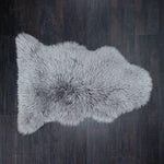 Beautiful long curly wool, pewter grey sheepskin. A stunning boho style soft genuine British sheepskin From The Wool Company 