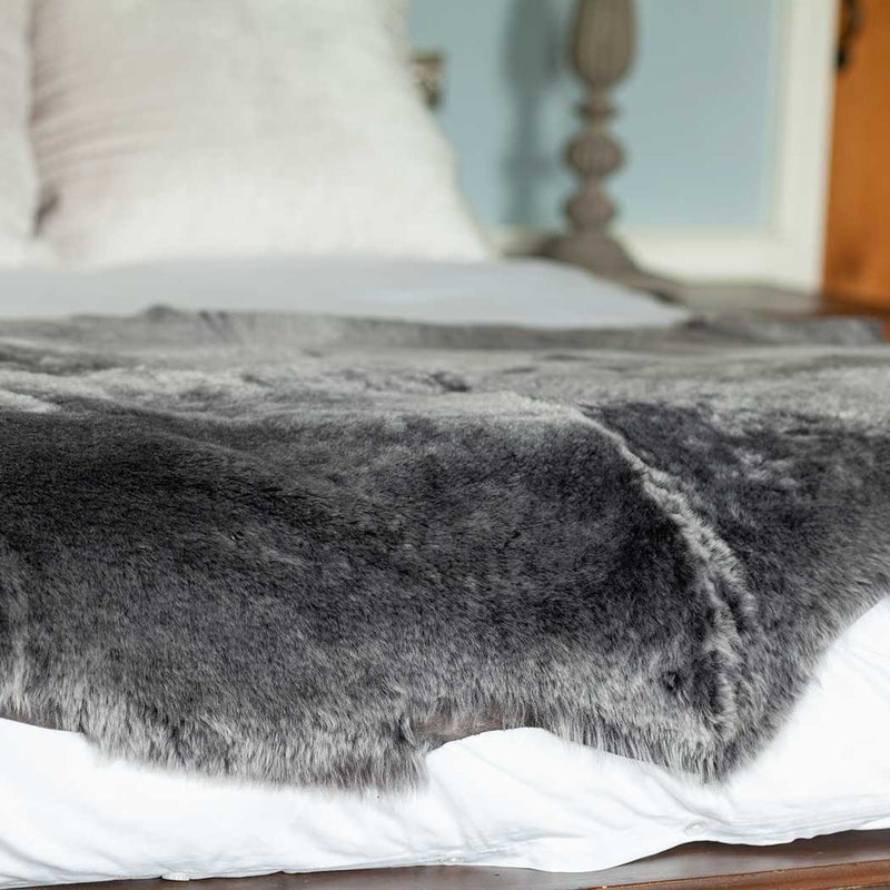 Quad-size sheepskin throw in shades of grey, silver, and charcoal extremely soft & silky, beautifully finished stunning piece