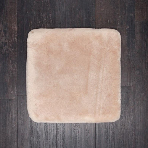 Neutral champagne beige colour lambskin cushion, dense, shorn fleece & super soft & supportive From The Wool Company