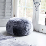 Genuine sheepskin pouffe, super-soft, thick,& luxurious shorn fleece in silver graphite grey colourway From The Wool Company