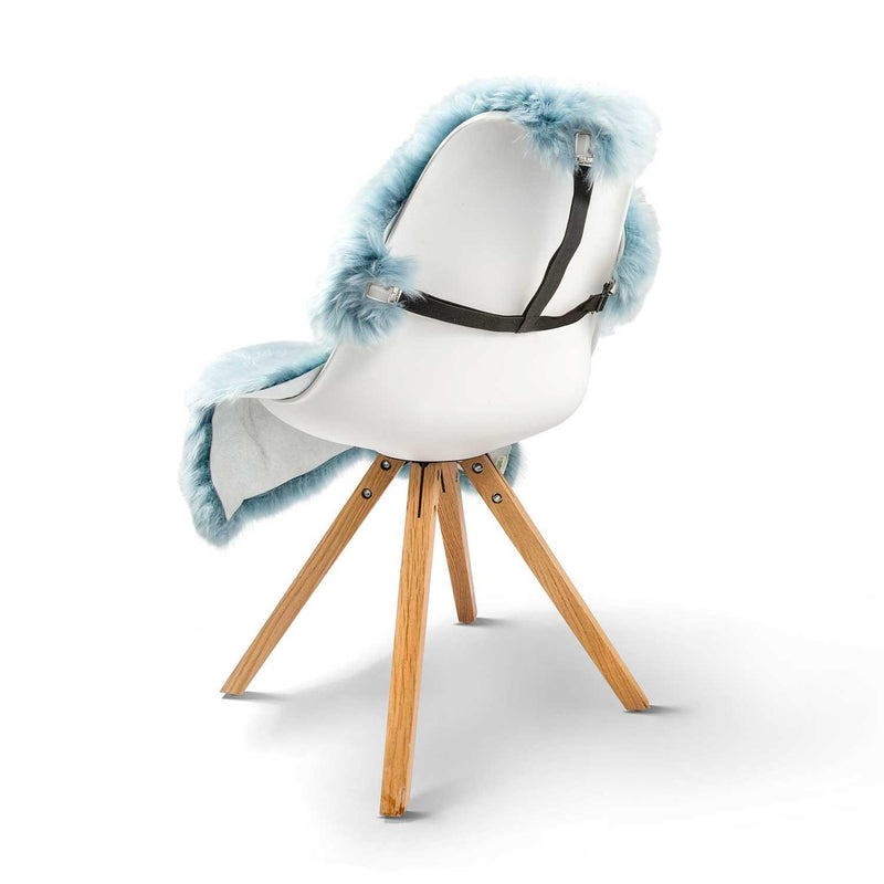 Hold your sheepskin in place on a chair or wheelchair via adjustable clips that attach to three sides of the sheepskin. 