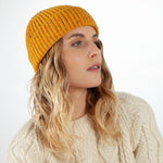 100% super-soft Merino wool classic fine-rib knitted beanie hat in a flecked rich mustard yellow made in England top-quality 