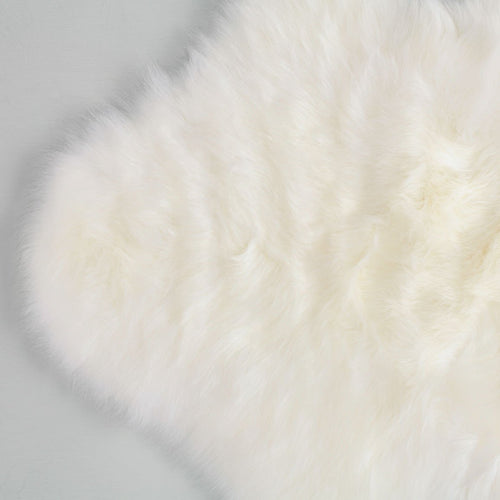 Extremely soft, luxurious, & beautiful to touch ivory white baby sheepskin, carefully selected for a naturally short fleece 