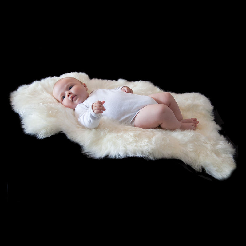 Soft, luxurious, & beautiful to touch ivory white baby sheepskin, selected for a naturally short fleece By The Wool Company