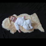 Extremely soft, luxurious, & beautiful to touch light honey baby sheepskin, carefully selected for a naturally short fleece 